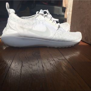 White Nike women’s running shoes